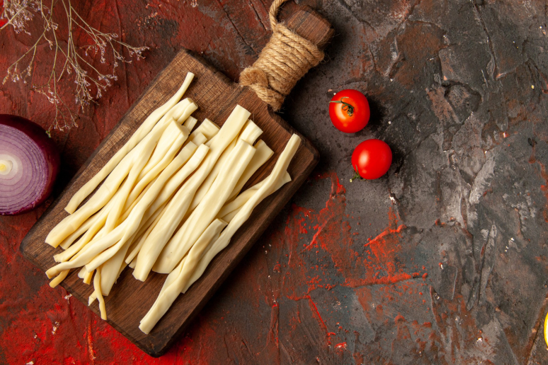 Is String Cheese Healthy for Weight Loss? A close-up of string cheese with nutritional facts